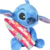 DISNEY STITCH - PELUCHE AVEC SA PLANCHE DE SURF 25 CM