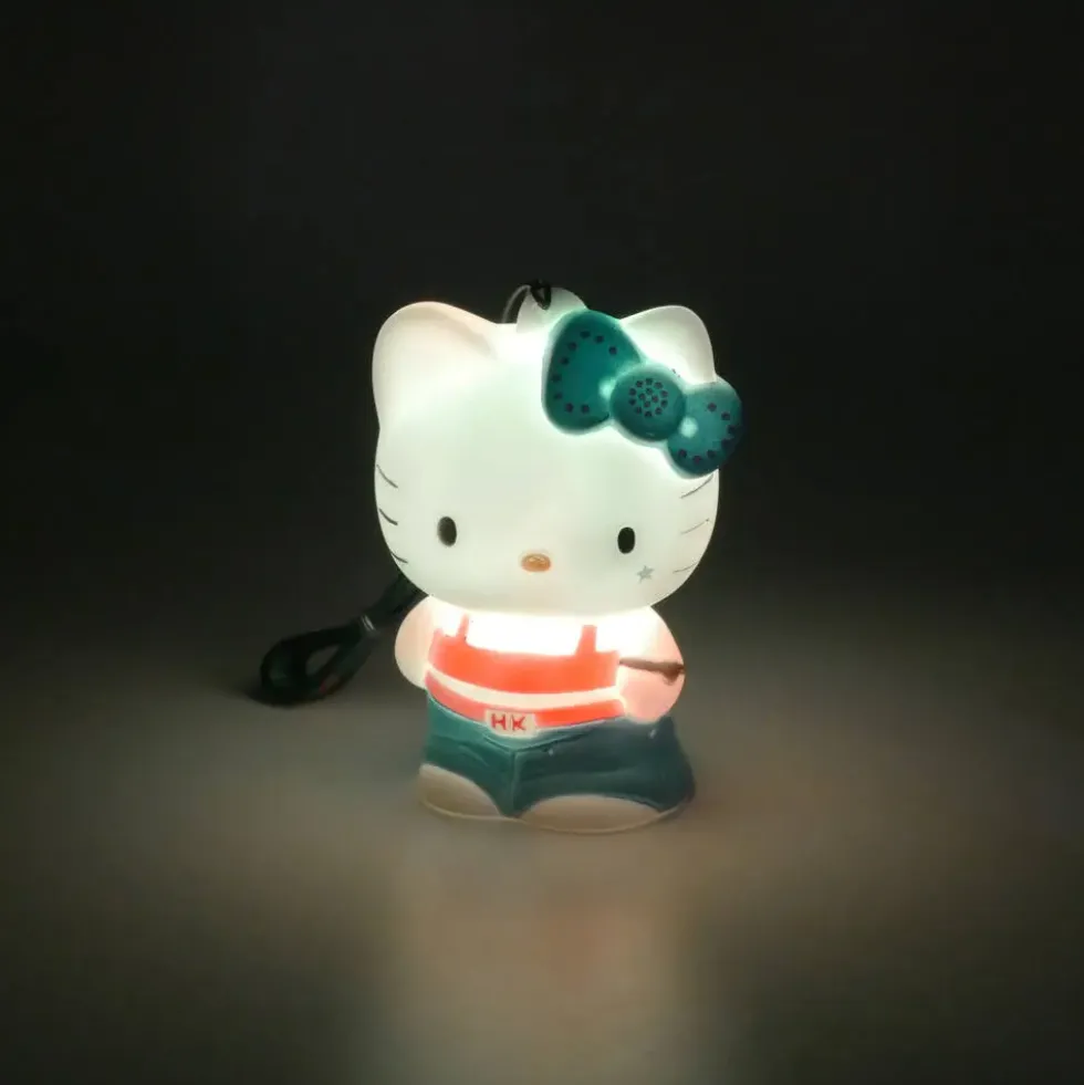 HELLO KITTY - FIGURINE LUMINEUSE HIP HOP AVEC DRAGONNE