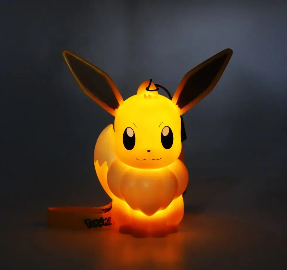 POKEMON - FIGURINE LUMINEUSE EVOLI AVEC DRAGONNE