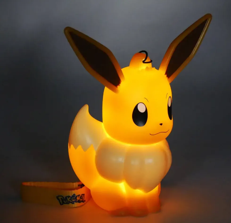 POKEMON - FIGURINE LUMINEUSE EVOLI AVEC DRAGONNE