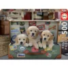 PUZZLE 500 PIECES DES CHIOTS DANS LES BAGAGES